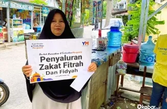 Ilustrasi penyaluran zakat kepada masyarakat yang berhak menerima menjelang Idul Fitri 1447 Hijriah. (Foto: Ist)