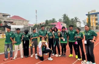 Atlet Kabupaten Pasaman berfoto bersama membawa 67 medali dari Porprov XVI. (Foto: Ist)